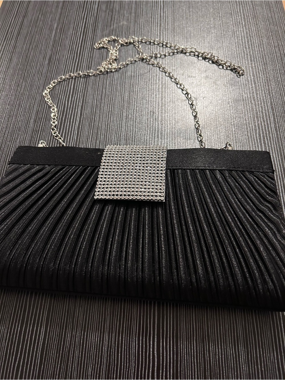 Black Pleated Evening Clutch with Silver Chain and Rhinestone Accent